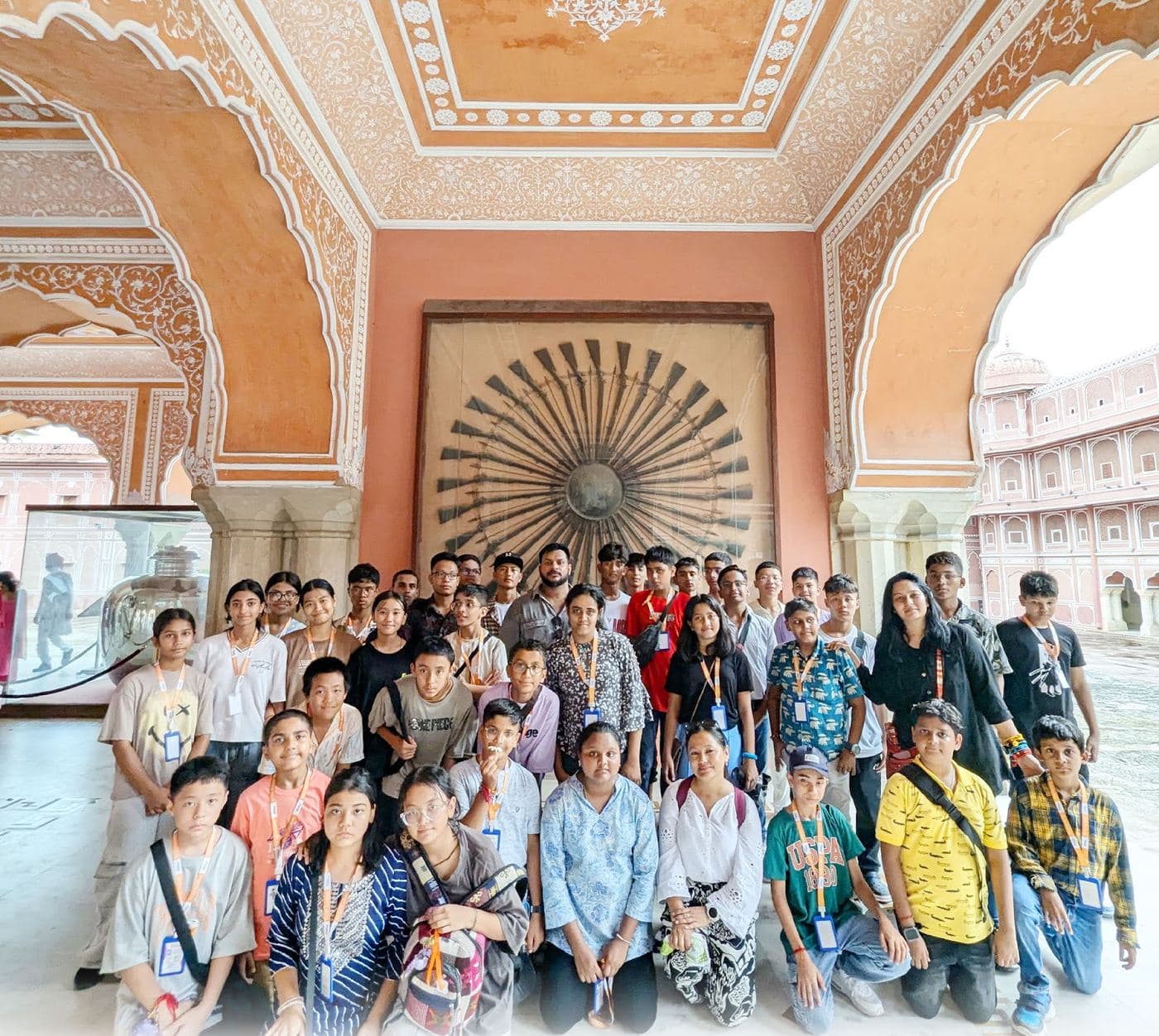 Under the painted ceiling, all present