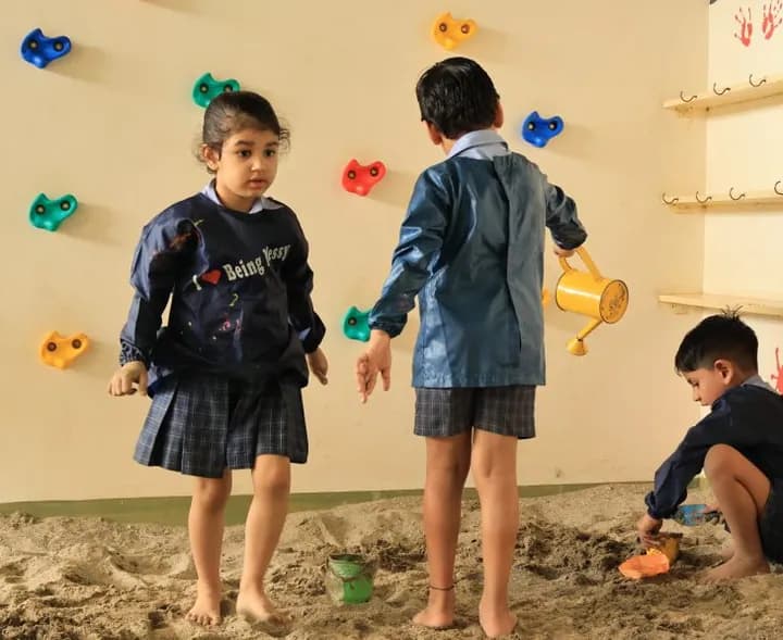 Children playing in the indoor sandpit