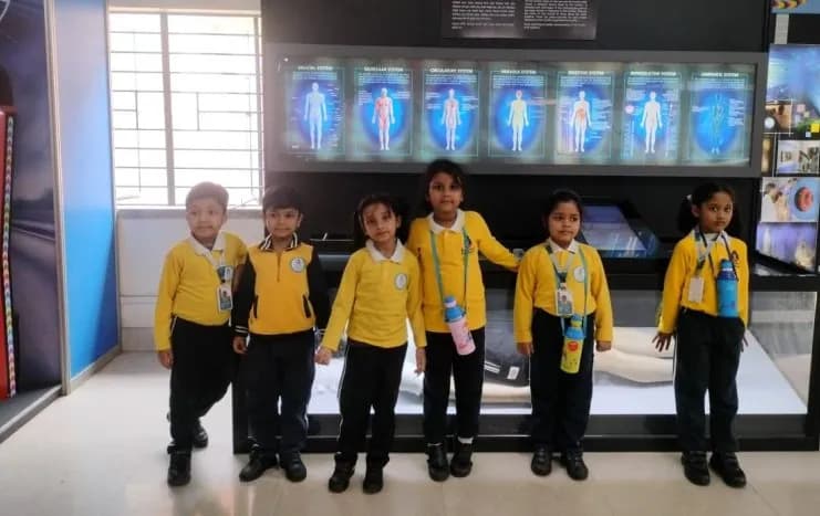 Children at an interactive human-body exhibit in a science centre