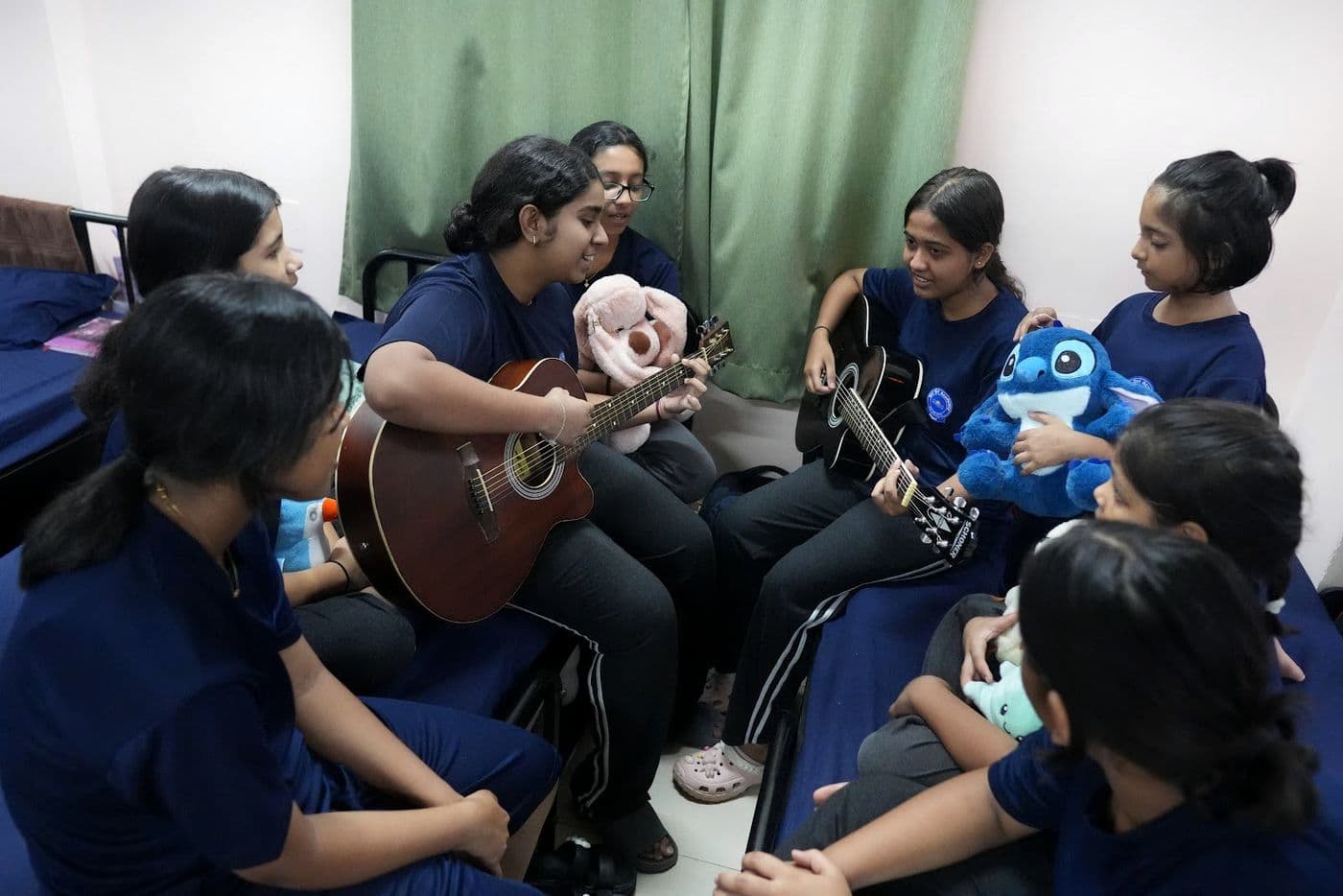 Sri Sri Academy residential students in a hostel room