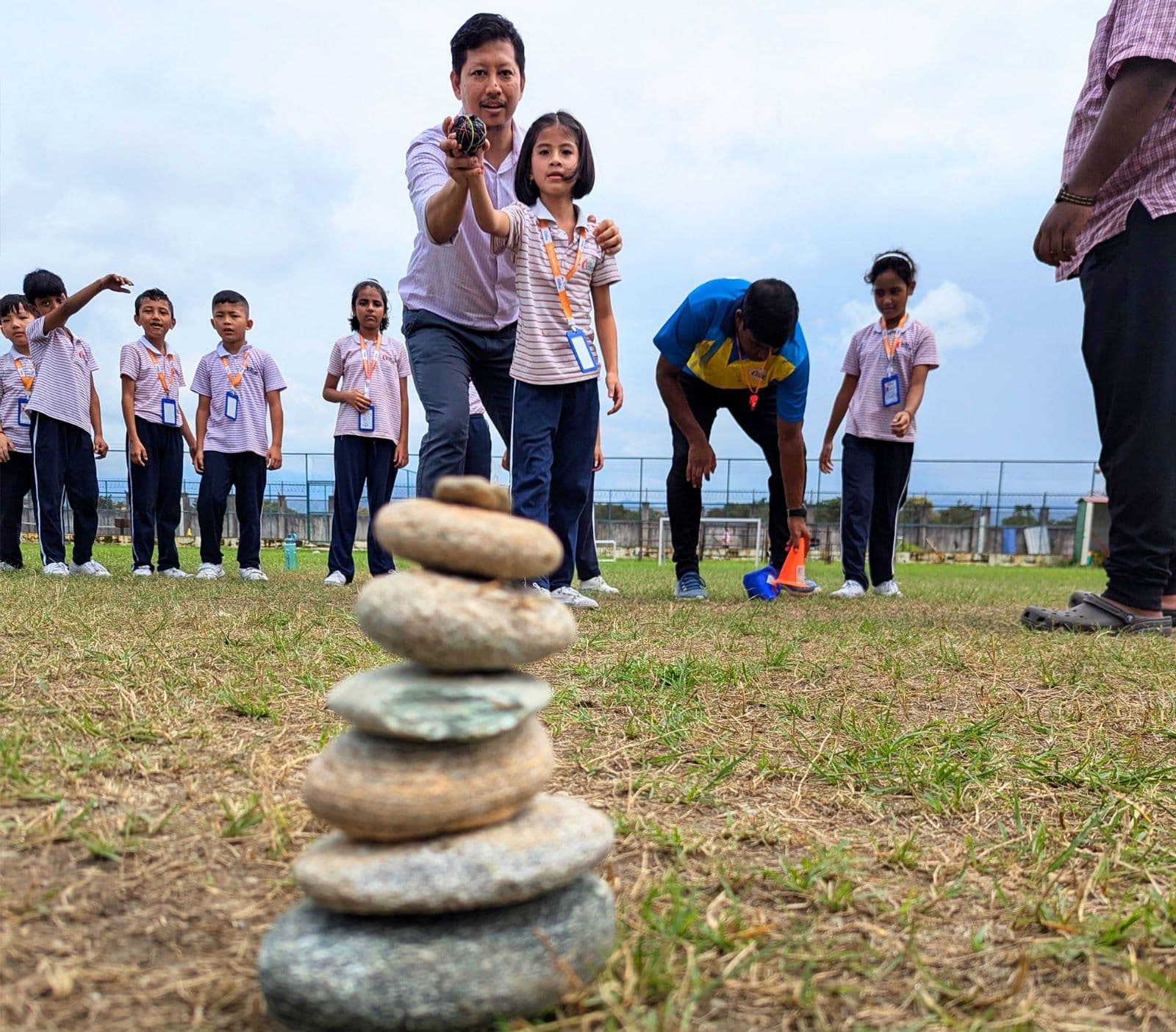 Stone stacking on the school field