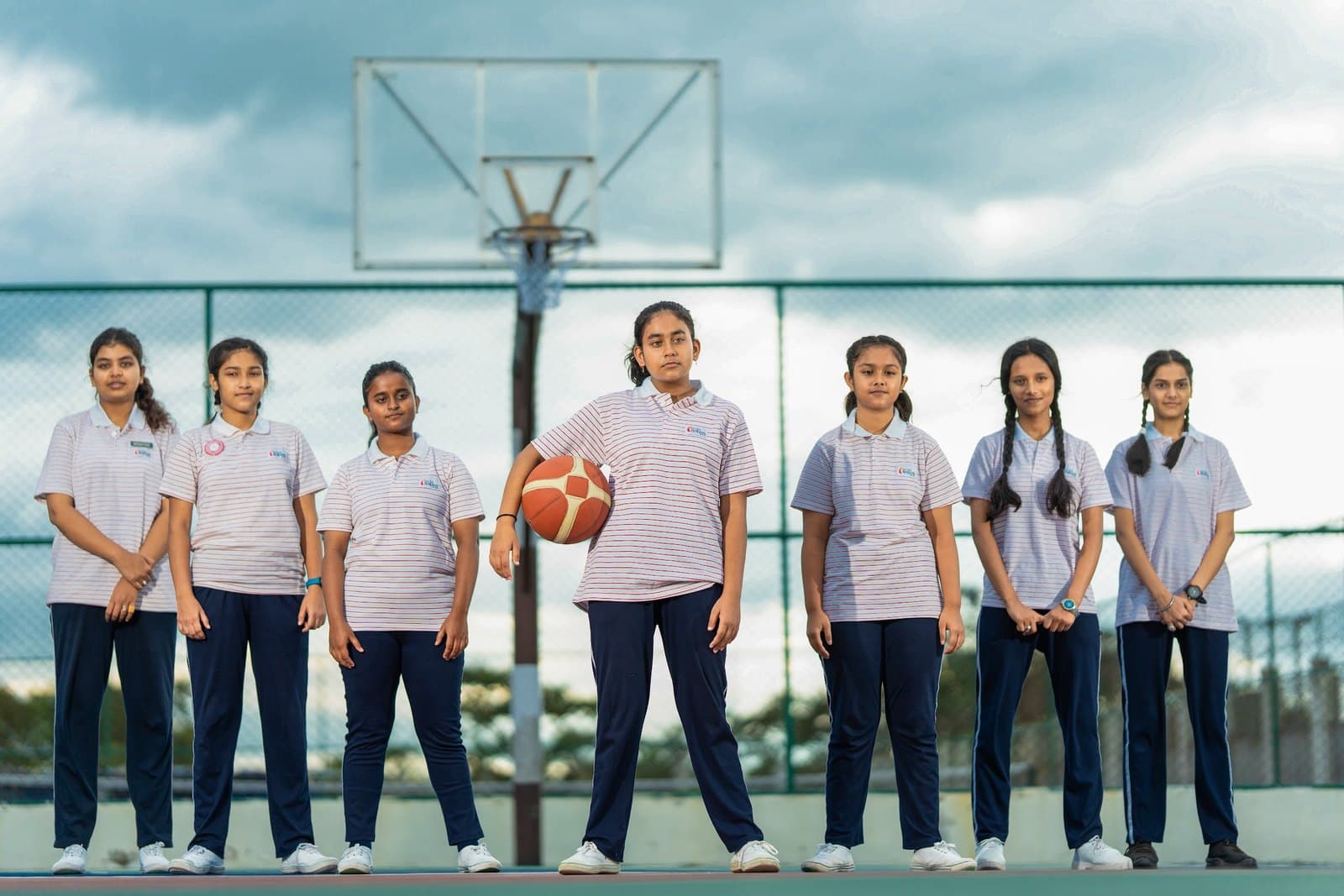 Sri Sri Academy Siliguri students on the basketball court