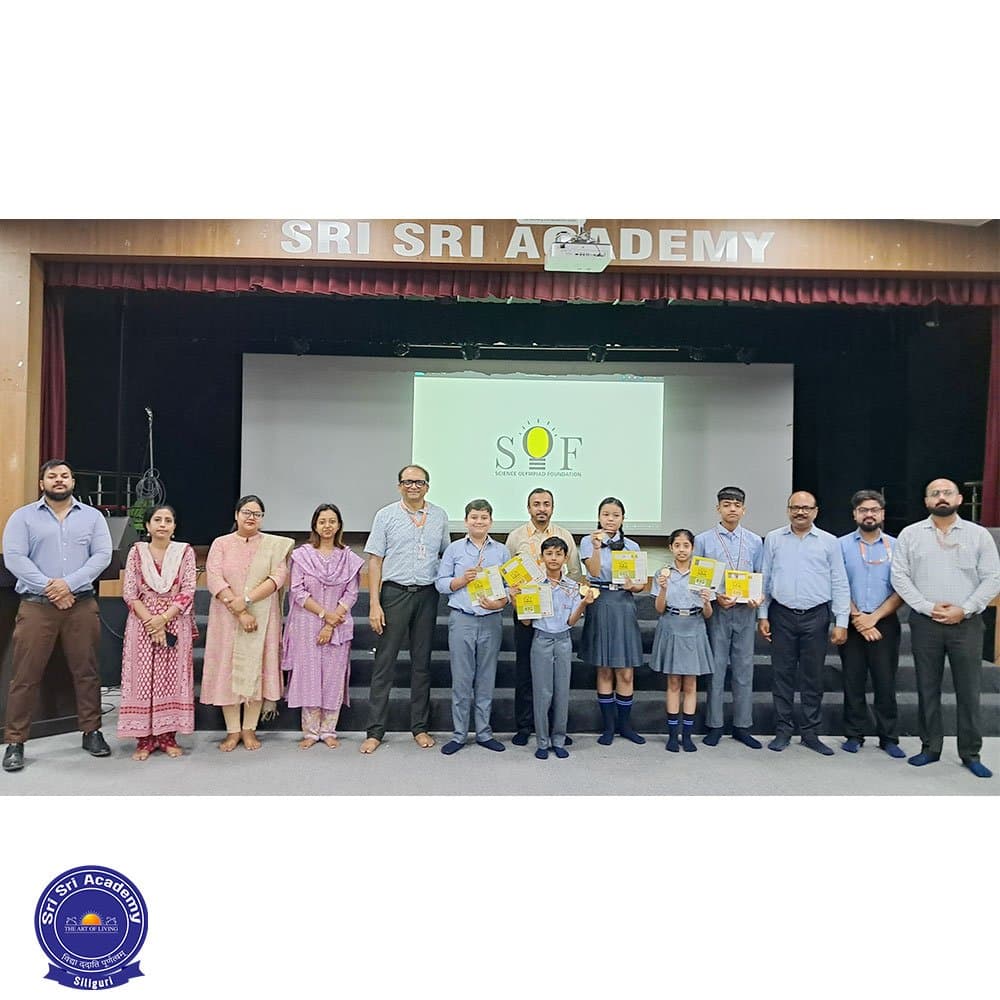 Sri Sri Academy students with their olympiad medals